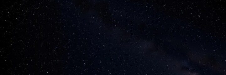 A mesmerizing night sky full of sparkling stars against a black background, twinkling, universe