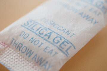 Packet With Silica Gel on table ,