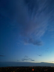 Aerial Night View of Illuminated Luton City Homes During Full Moon Night of October 27th, 2023