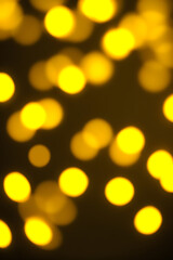Obraz premium Ethereal Yellow Bokeh Lights Abstract Background