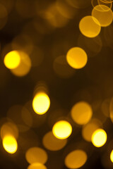 Obraz premium Ethereal Yellow Bokeh Lights Abstract Background