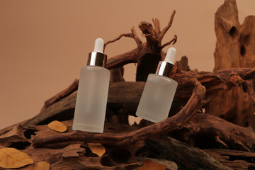 Frosted Glass Dropper Bottle on Natural Wood Background for Organic Skincare and Serum Branding