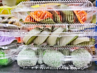 Close up of assorted chinese kueh ,cakes and sweet food sold at street stall in Singapore