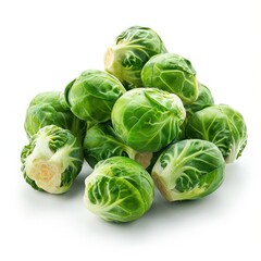 Fototapeta premium Pile of freshly cooked Brussels sprouts on white surface.