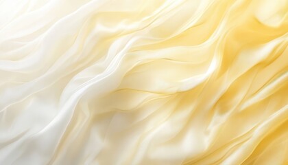 A close-up of a soft, flowing golden fabric with subtle texture