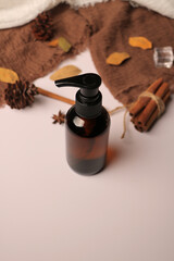 Amber Glass Pump Bottle with Autumn Spa Decor for Organic Skincare Packaging