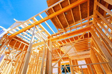 Construction in progress large construction site, showcasing wooden beams structure of building under frame