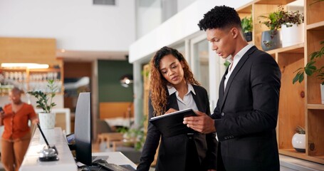 Reception, employees and tablet with teamwork, hotel and accommodation with cooperation. Coworkers, hospitality and service with tech, internet and digital app for schedule and reservation for lodge