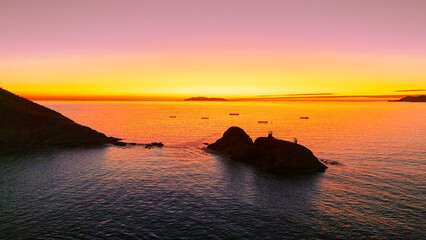 Last hours of light illuminate the small islands full of sahuaros in front of San Carlos Sonora,...