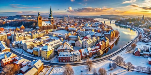Obraz premium Aerial view of Pirna, transformed into a wintry wonderland.