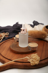 Frosted Glass Dropper Bottles on Wooden Tray for Skincare and Wellness Product Display