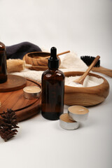  Amber Glass Dropper Bottle with Wooden Tray and Natural Spa Decor for Skincare Mockup