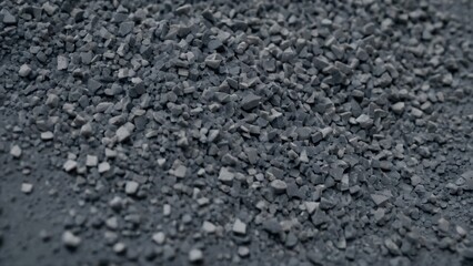 High-resolution dark gravel texture with finely detailed pebbles and natural roughness. Ideal for realistic architectural renderings, landscaping projects, and graphic design. Perfect for creating ind