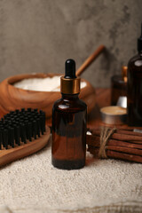 Amber Glass Bottles and Rustic Wooden Bowls with Natural Elements