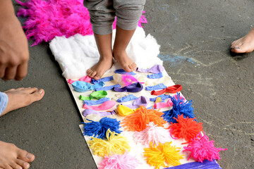Therapy for children, also known as sensory stimulation, children stepping on wool, a process that...