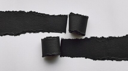 Obraz premium A two set of black torn paper effect.