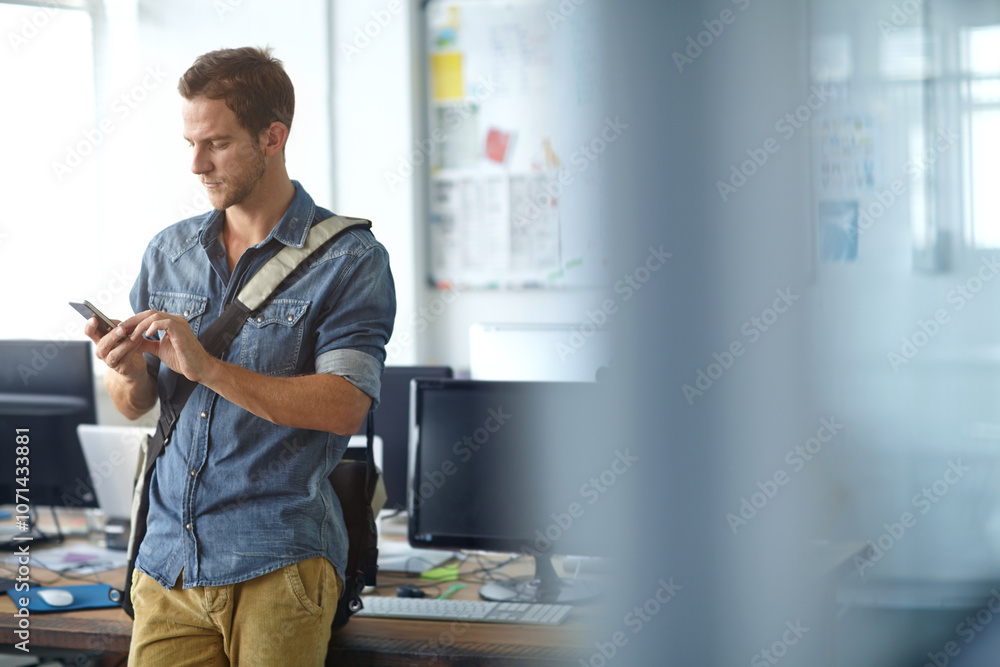 Poster Creative, office and man with phone, online chat and search for web business connection at digital agency. Typing, smartphone and graphic designer at desk on mobile app for networking at tech startup