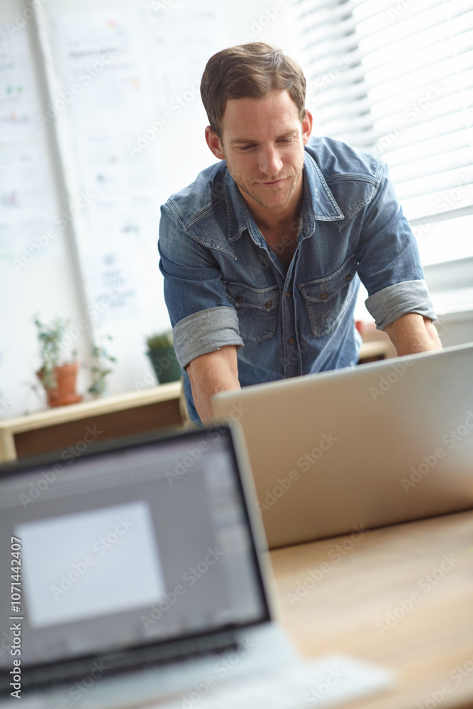 Poster Man, laptop or reading in office for research, tech support or internet problem solving. Network error, IT guy or typing on computer for business, email contact or update company website in workplace