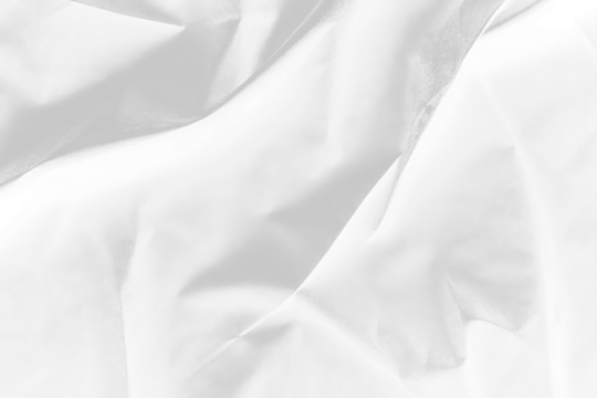 Abstract transparent fabric background with smooth, flowing folds.