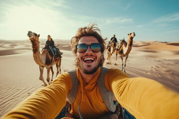 Happy young man tourist having fun enjoying group camel ride tour in the desert