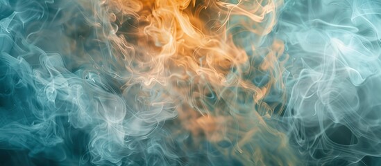 Obraz premium A blue and orange smokey background with a yellow flame