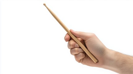 A person holds a pair of drumsticks ready to play music in a creative space