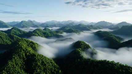 A misty mountain landscape with layers of fog and clouds flowing through the valleys, offering a tranquil and atmospheric view of natures beauty
