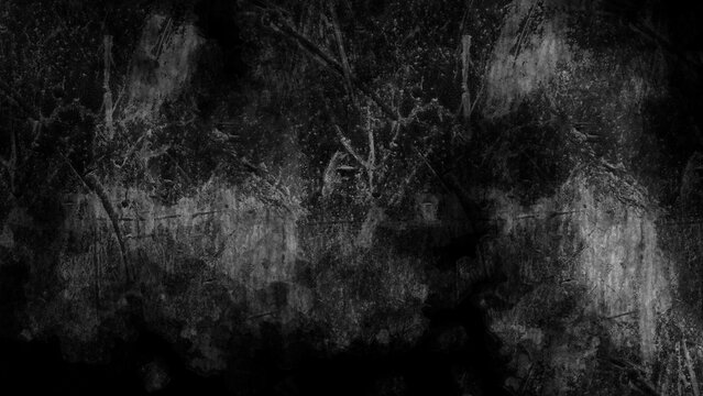 Black and white grunge texture with scratches and marks.