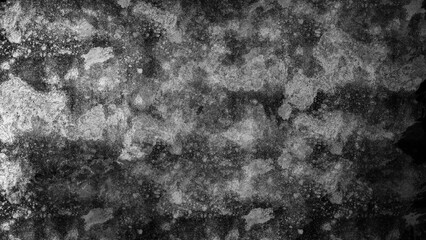 Gray and black abstract background with uneven texture.