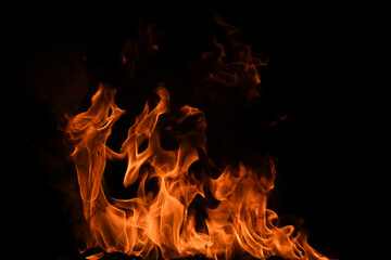 Fototapeta premium Fire flame isolate on black background. Burn flames, abstract texture. Art design for fire pattern, flame texture.