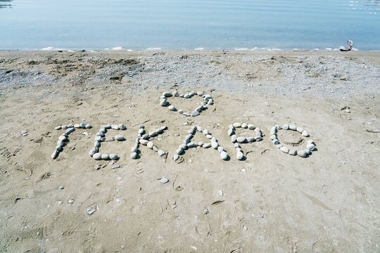 Tekapo Written in Stones on Lake Tekapo Beach: New Zealand Scenic Spot