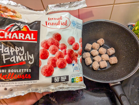 France, 20 September 2024 : Cooking Frozen Meatballs from Family-Sized Package in Pan