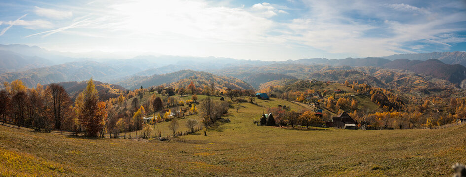 Fototapeta Panoramic overview of Magura village in Romania, near the Piatra Craiului mountains