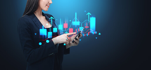 Businesswoman in dark suit using smartphone, analyzing stock dat