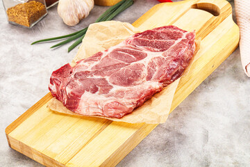 Raw pork neck steak for grill