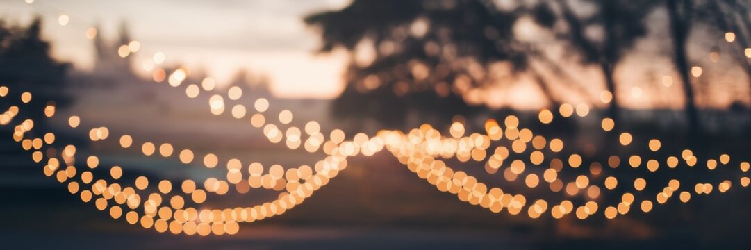 The banner is an abstract background with warm golden highlights and light blurring.