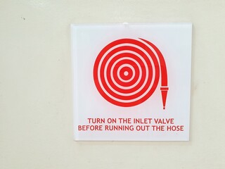 Fire security logo with fire hose