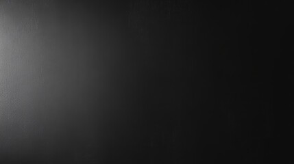 A smooth, dark surface with a gradient