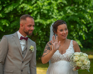 The happy wedding couple radiates joy on their special day. In lightness and harmony, they cherish...