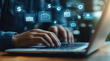 Obraz premium The businessman's hand uses a laptop, pointing to a virtual screen of money bag ICONS, charts or financial development charts, budgets and financial planning concepts.