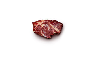 Obraz premium A raw lamb steak displayed on a plain white background, highlighting its freshness and suitability for gourmet cooking or grilling