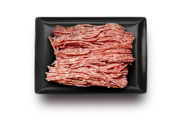 A portion of fresh raw ground beef displayed on a black tray against a plain white background, showcasing its quality and suitability for culinary preparation