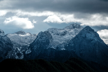 Fototapeta premium Clouds over mount Triglav, Slovenia