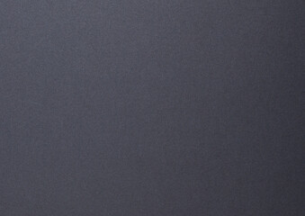 Dark designer paper background with a matte, smooth texture in rich charcoal gray. This minimalist,...