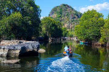 Maros Rammang-Rammang, clear river panorama, there are boats sailing down the river