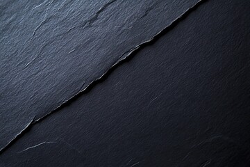 Dark slate stone background with a diagonal seam and a rough texture.