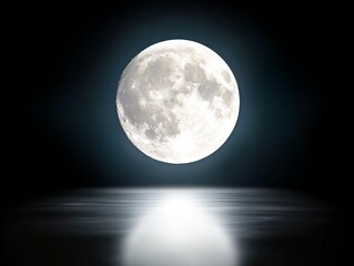 Obraz premium A full moon is reflected in the water of the ocean