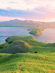 Beautiful and Colorful Sunrise form The Pacific Ocean at Gili Lawa, Komodo National Park, Indonesia. © Balnyes Visuals