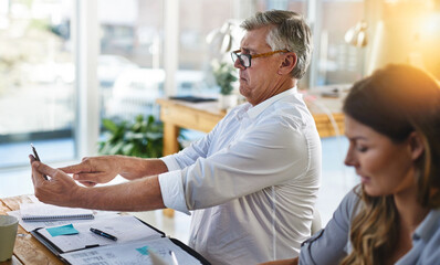 Man, glasses and vision problem with phone for contact, planning and difficulty reading in office....