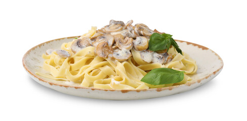 Delicious pasta with mushrooms and basil isolated on white